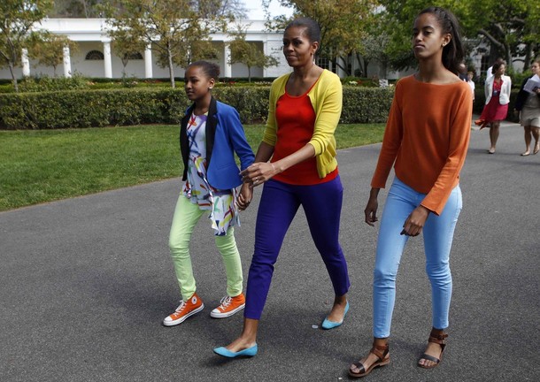 First lady Michelle Obama and kids walk at 2012 White House Easter Egg Roll at the White House in Washington