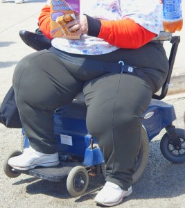 obese-woman-in-wheelchair-267x300