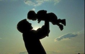 Novastock. The joy of a father's love in a family moment. father, son, child, silhouette,