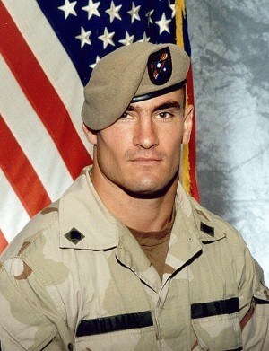 ** FILE ** Former Arizona Cardinals football player Pat Tillman, is shown in a June 2003 file photo, released by Photography Plus. Investigators probing the friendly fire death in Afghanistan of former football star Pat Tillman found no criminal negligence, a government official said Monday, March 26, 2007. (AP Photo/Photography Plus via Williamson Stealth Media Solutions, FILE) ** NO SALES **