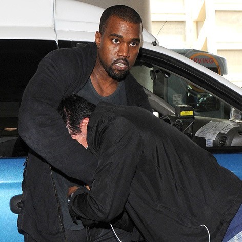 Kanye West Tussles With A Photographer At LAX