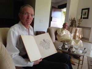 (RNS1-jun5) Hassan Bargach at his home in Rabat, Morocco on June 4, 2014, showing the book presented to his family by the Spanish government tracing its roots to the Iberian town of Hornachos. For use with RNS-MORISCOS-SPAIN, transmitted on June 5, 2014, Photo by Gil Shefler.