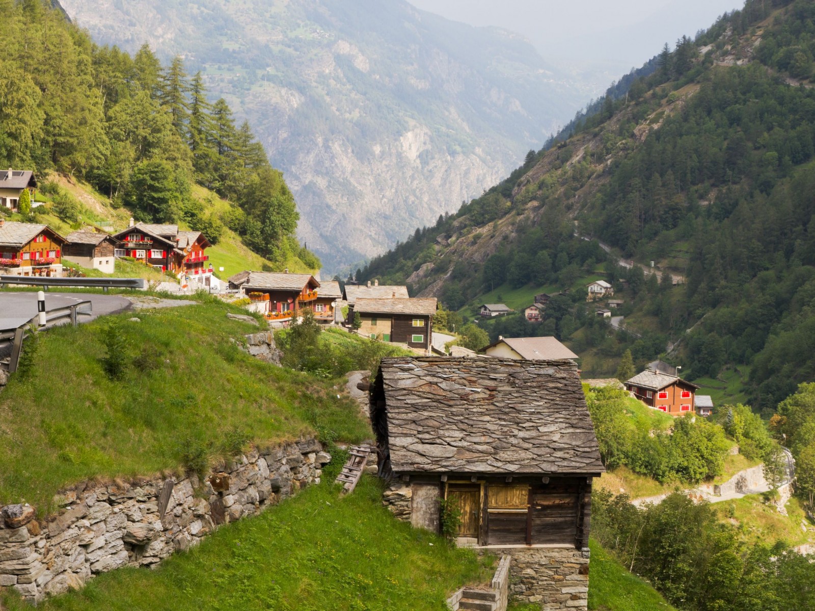 Travel-To-Switzerland-Small-Swiss-Village-Settlement-Saas-Balen-of-Wooden-Slate-Roof-Houses-in-Saas-Valley-Canton-Valais-Switzerland-1600x1200[1]
