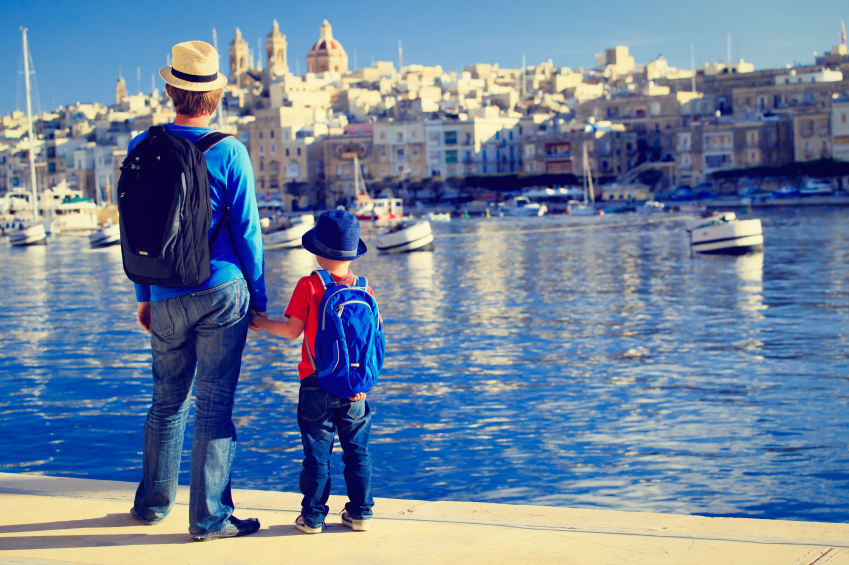 father and son looking at city of Valetta