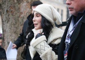 A decrepit Cher was thawed from her crypt and hauled down to the march
